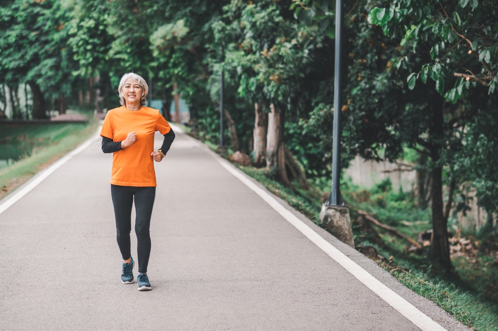 woman power walking for weight loss outdoors