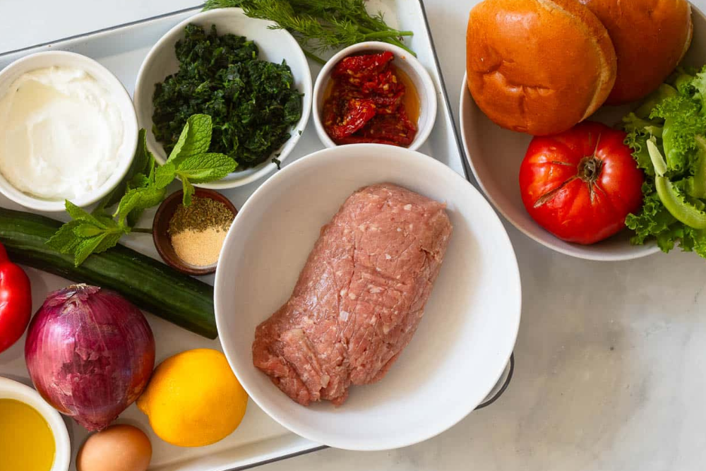 Top view of raw ground turkey and chili ingredients.