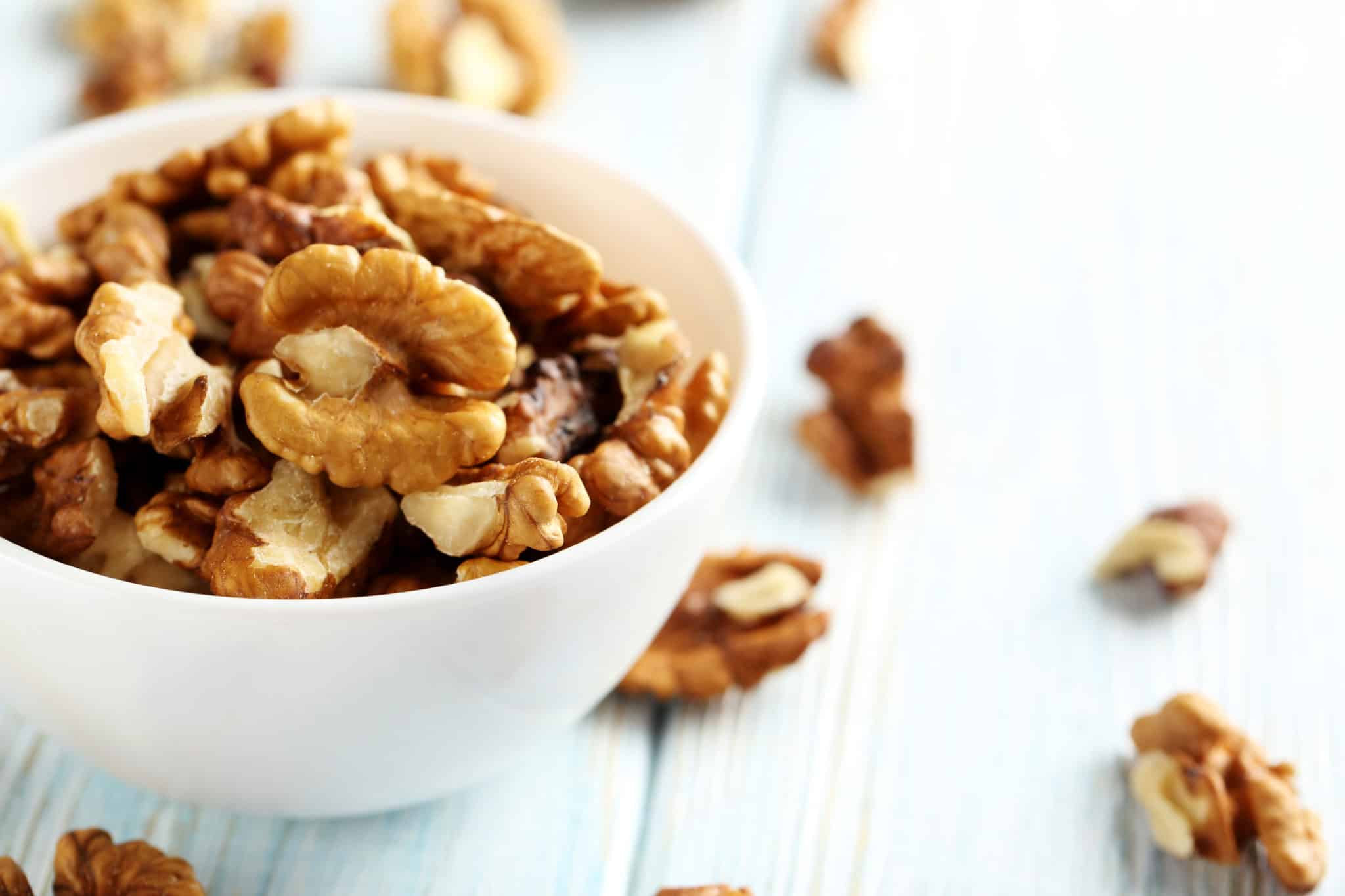 Close up of a bowl of walnuts.