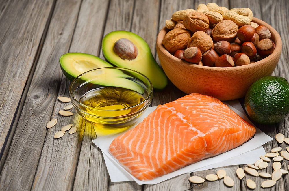 A selection of foods containing healthy monounsaturated fats.