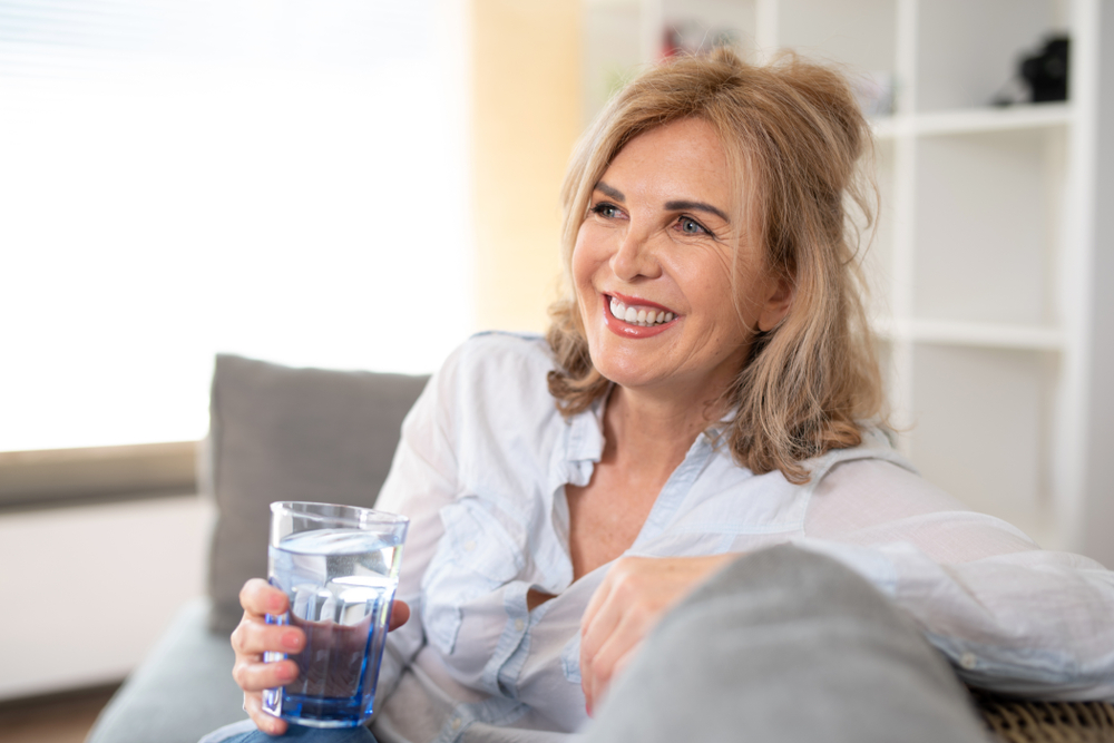 woman drinking water alcohol free