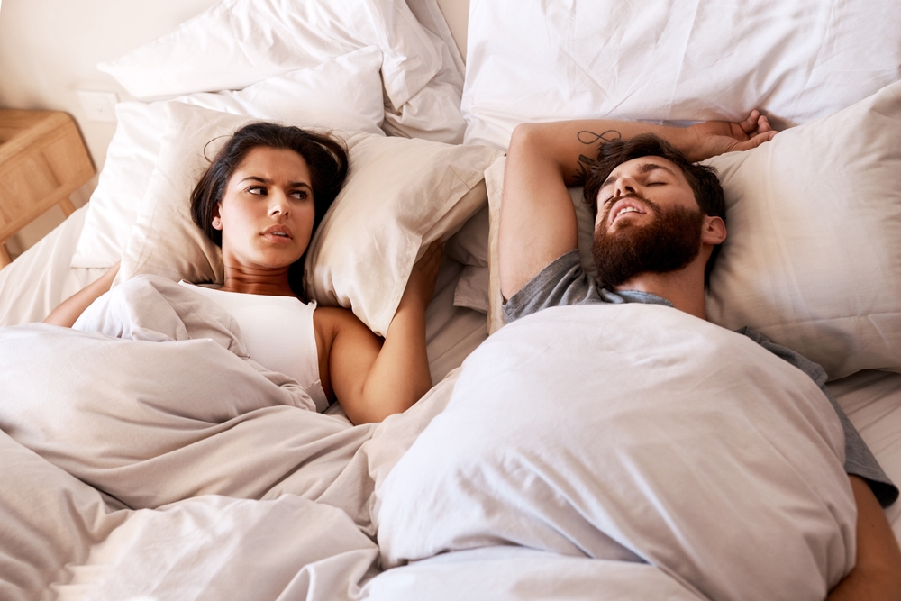 woman wanting sleep divorce in bed