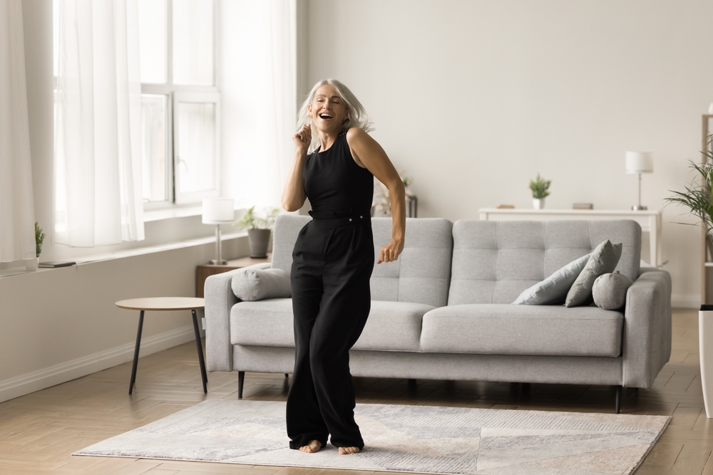 woman dancing in living room