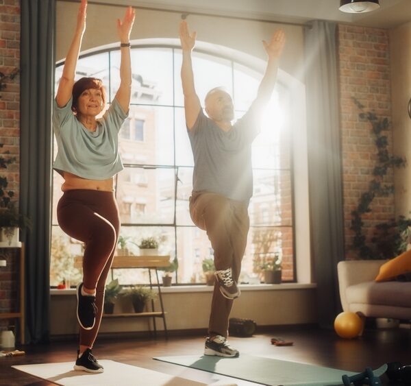 couple doing standing balance exercises